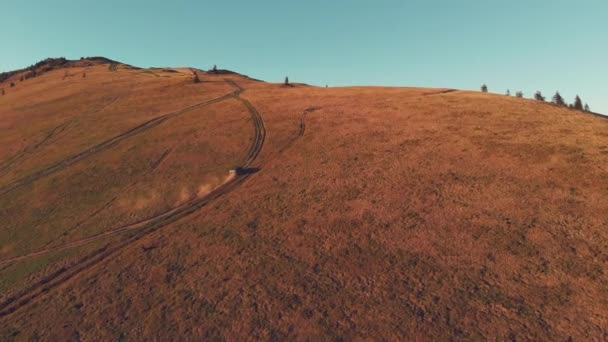 Top view of a car driving on mountain slope — Stock Video