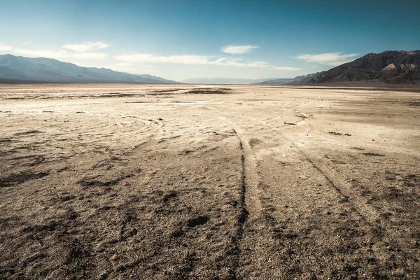 Landscaoe of salt flats desert in Badwater Basin in summer, Death Valley National Park, California, USA.