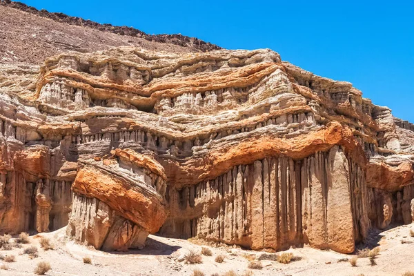 Geological rock formation in the Red Cliffs Natural Preserve, Red Rock Canyon State Park, California, summer, USA.
