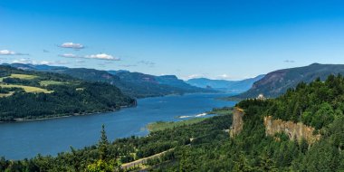 Scenic overlooking view at the Columbia River Gorge from the Portland Women Forum, Oregon, USA. clipart