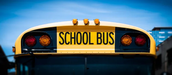 American school bus front vehicle closeup.