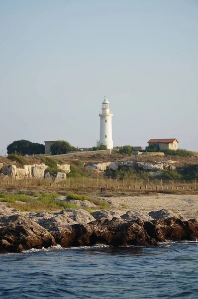 Világítótorony a tenger mellett, Paphos, Ciprus Stock Fotó