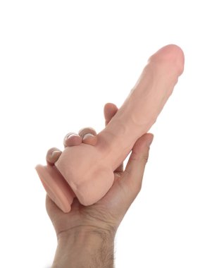 Realistic dildo in mans hand isolated on white