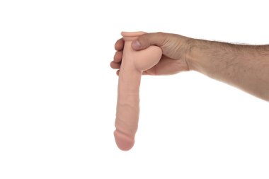 Realistic dildo in mans hand isolated on white