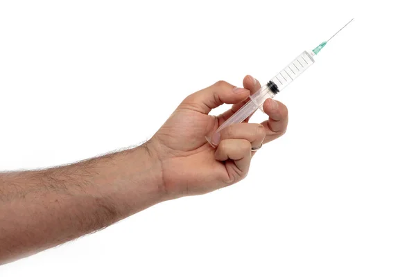 Male hand with a syringe with clear liquid isolated on white — Stock Photo, Image