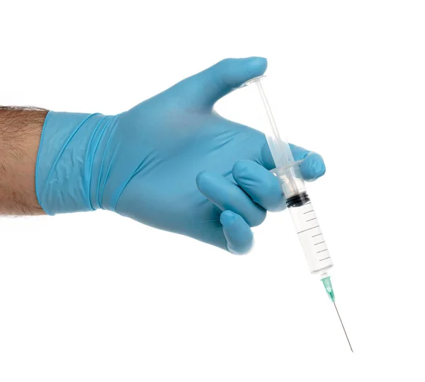Man's gloved hand with a syringe with clear liquid isolated on white — Stock Photo, Image