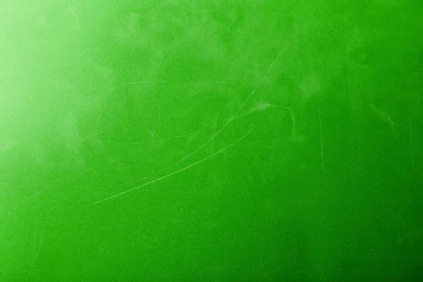 Textura verde suja abstrata brilhante com arranhões e arranhões — Fotografia de Stock