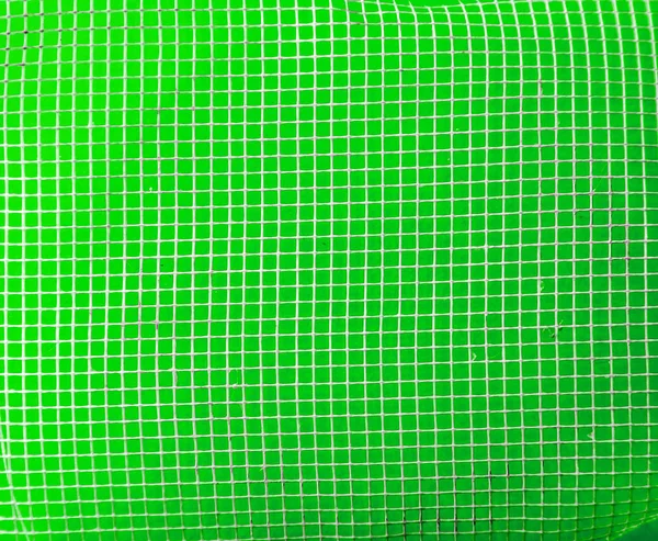 Textura verde brilhante com seções quadradas — Fotografia de Stock