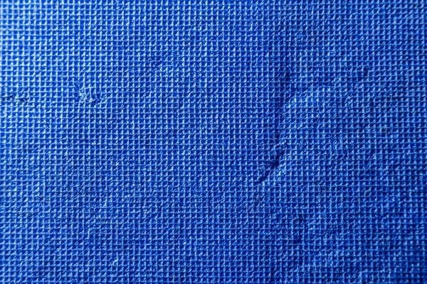 Texture bleu vif composée de petits carrés avec rayures et éraflures — Photo