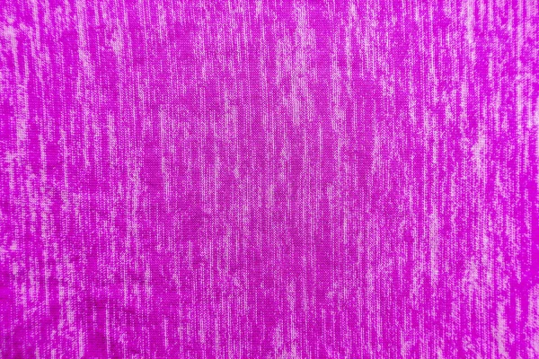 Uma textura de tecido roxo uniformemente iluminada com sombras suaves . — Fotografia de Stock