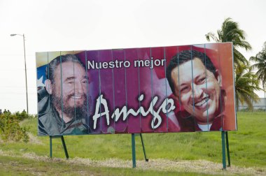 HAVANA, CUBA - June 10, 2015: Billboard depicting Fidel Castro & Hugo Chavez. The sentence says 
