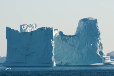 Floating Icebergs - Scoresby Sound - Greenland clipart