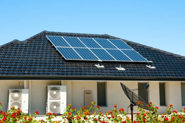 Residential Solar Panels on Roof clipart