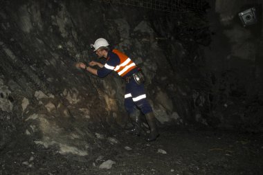 Underground Geologist in Mining Tunnel clipart