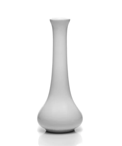 white dishes on a white background, little vase
