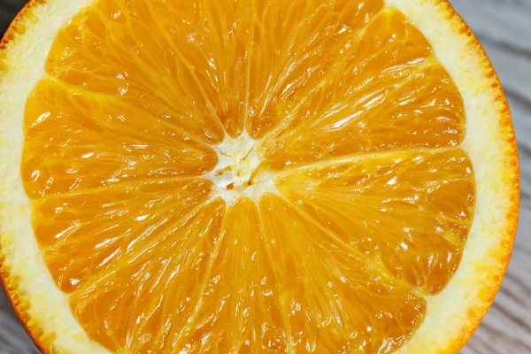 Laranja em um close-up de redução — Fotografia de Stock