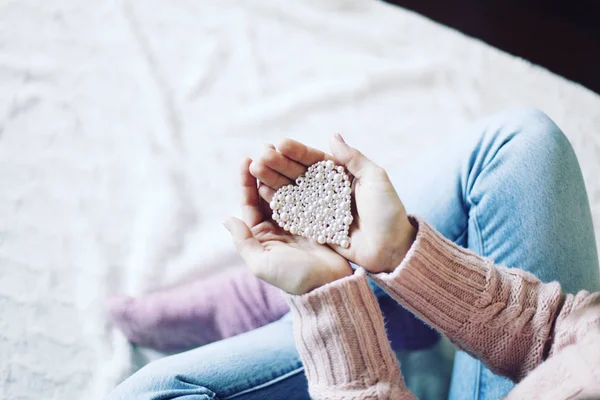 Female Hands Holding Little Pearl Heart — Stock Photo, Image