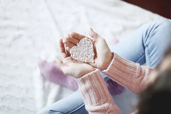 Female Hands Holding Little Pearl Heart — Stock Photo, Image