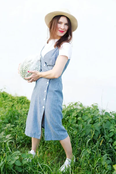 Young Woman Hat Denim Dress Posing Watermelon Knitted Bag — Stock Photo, Image