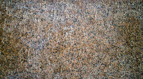 The texture of the red granite of different types. Background