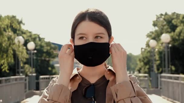 Girl Takes Mask Street — Stock Video