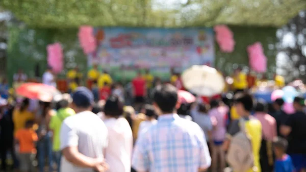 Many people blur watching the stage performance, blurred images.