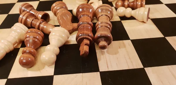 How to play wooden board game chess. Improvisation and Different angles of chess sets, pieces and chessboard. White and black figures and board of chess game.