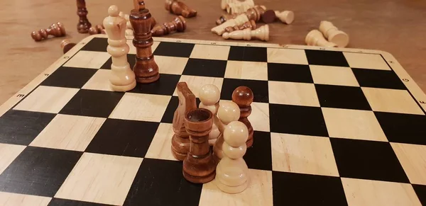How to play wooden board game chess. Improvisation and Different angles of chess sets, pieces and chessboard. White and black figures and board of chess game.