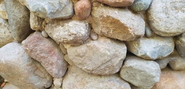 Arka plan ve inşa taş duvar dokusu büyük kayalardan yapılmış.