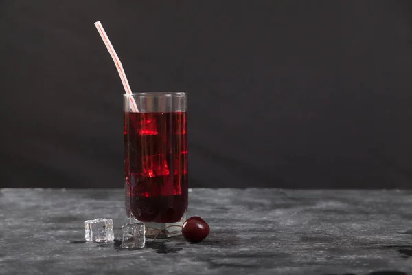 Cold Cherry Juice Ice Glass Straw Stands Black Background Copy — Stock Photo, Image