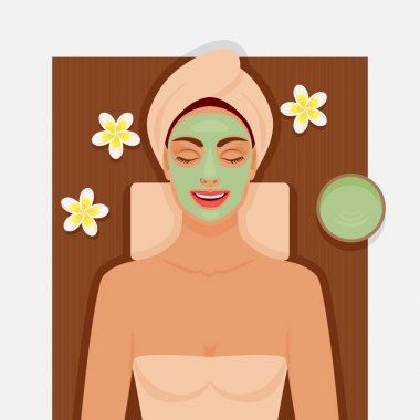 Spa terapisi. Yeşil yüz maskesi ile kız