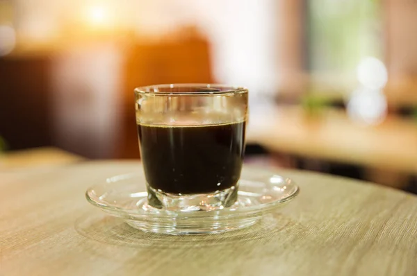 Nahaufnahme Blak Kaffeetasse Auf Hölzernem Schreibtisch Coffeeshop Vintage Warmem Licht — Stockfoto