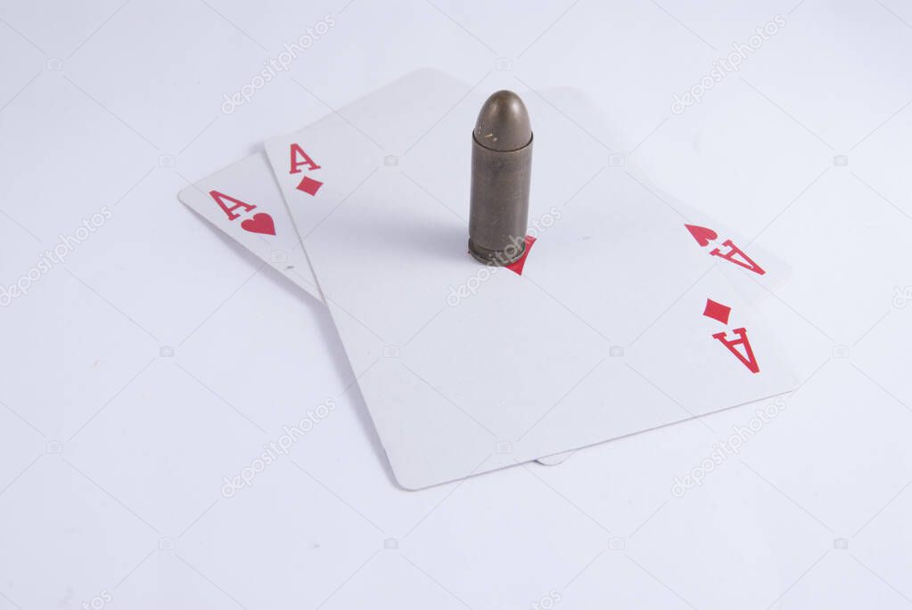 double aces Texas holdem poker cards and Casino guns bullets