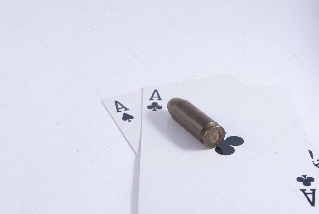 double aces Texas holdem poker cards and Casino guns bullets