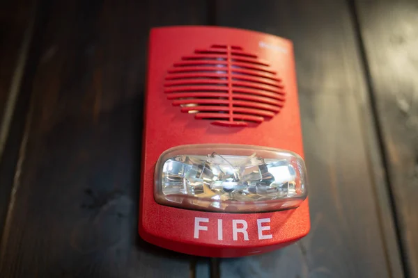 Red Fire Alarm Device Wooden Textured Wall Surface — Stock Photo, Image