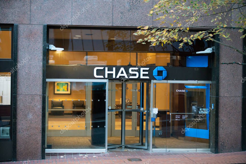 Portland, OR / USA - October 6 2018: Chase bank office branch entrance in downtown with a logo on top.
