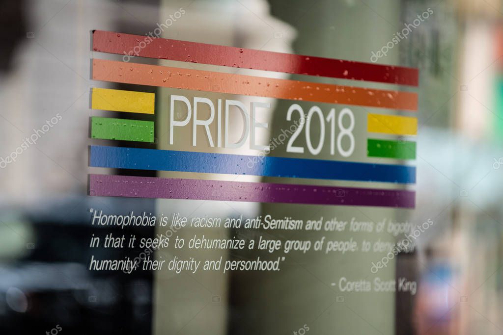 Portland, OR / USA - June 22 2018: Pride 2018 support sticker on the window of the shop in downtown