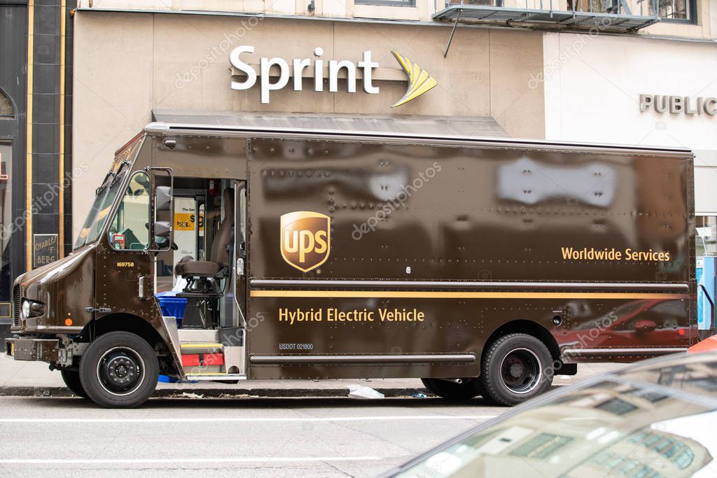 Portland, OR / USA - August 3 2018: UPS delivery truck parked at the curb