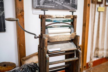 Seaside, OR / USA - June 23 2018: Antique Wringer washing machine built in 1898 on the display in the Garibaldi museum clipart