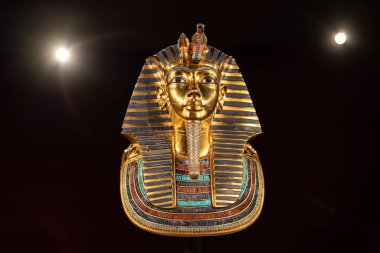Portland, OR / USA - November 10 2018:  King Tutankhamun Egyptian exhibit on the display at the Oregon museum of science and industry (OMSI). Wall of the tomb shrine is decorated with hieroglyphics clipart