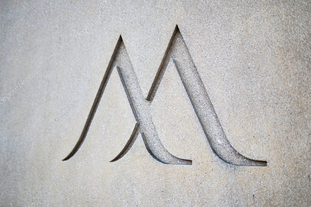 Portland, OR / USA - November 19 2018: Marriott hotel sign engraved in the concrete wall of the building.