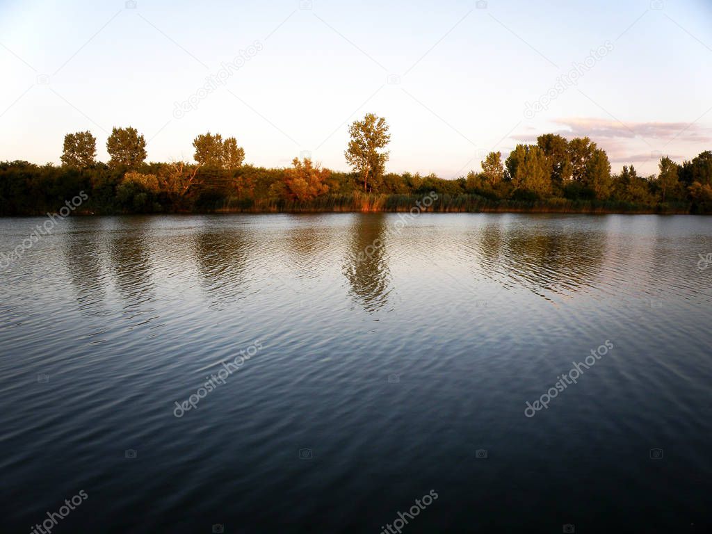 Beautiful Colorful Landscape with Trees Reflecting in Tranquil River