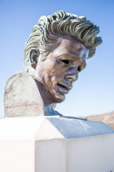Los Angeles, California / United States - October 3, 2015: In the sunshine of Griffith Park outside the Griffith Observatory home of the iconic scene in Rebel Without a Cause, stands a monument to the actor James Dean
.