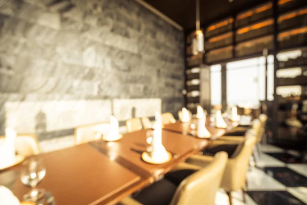 Abstract blur and defocused restaurant and coffee shop interior for background