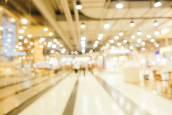 Abstract blur and defocused shopping mall in department store interior for background