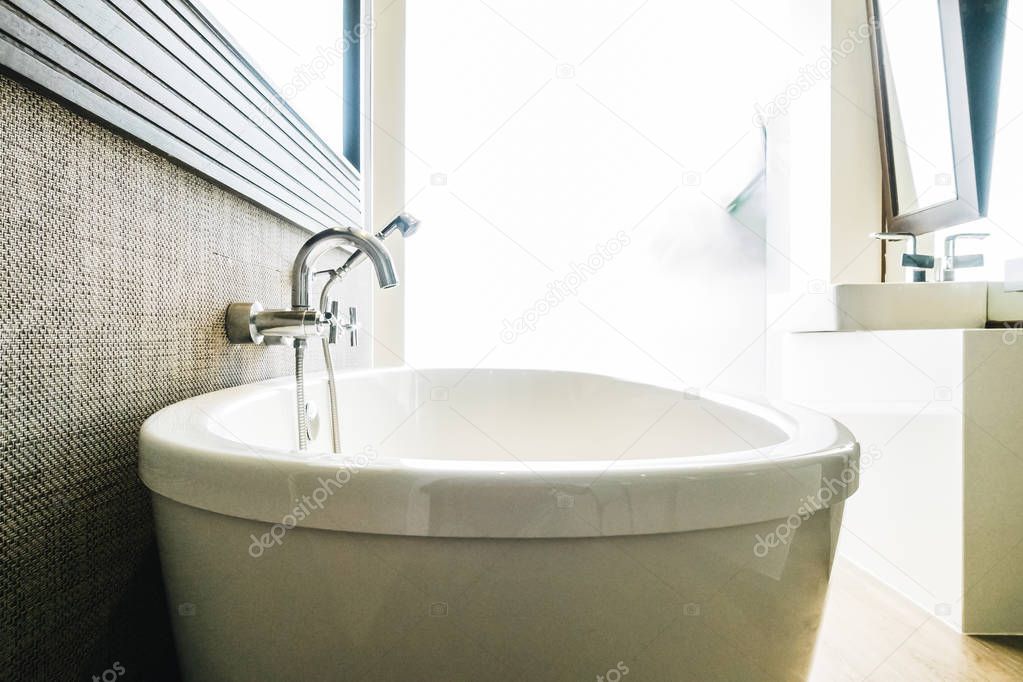 Beautiful luxury white bathtub decoration in bathroom interior