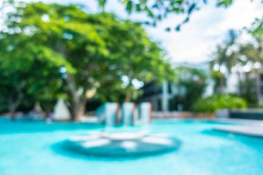 Soyut bulanıklık ve ufuk güzel açık yüzme havuzunda otel ve tatil arka planı için