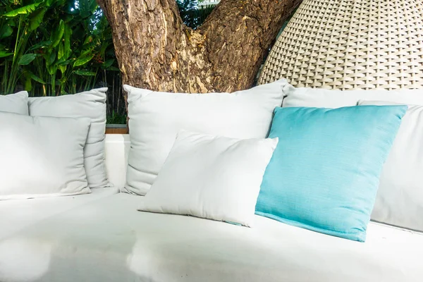 Comfortable pillow on sofa decoration outdoor patio with tropical and nature view