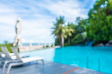 Soyut bulanıklık ve ufuk güzel açık yüzme havuzunda otel ve tatil arka planı için