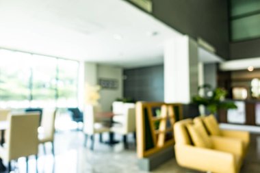 Özet olarak, arka plan için soyut bulanık ve odaksız otel ve lobi iç mekanı